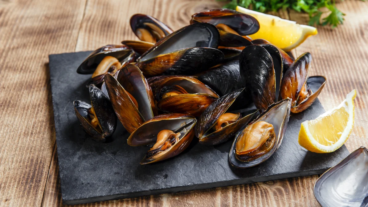 Order Black Mussel 1/2 lb. food online from Red Crab Juicy Seafood store, Cleveland on bringmethat.com