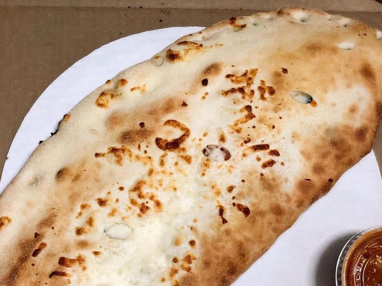 Order BUFFALO CHICKEN CALZONE food online from Lisa's Family Pizzeria store, Melrose on bringmethat.com