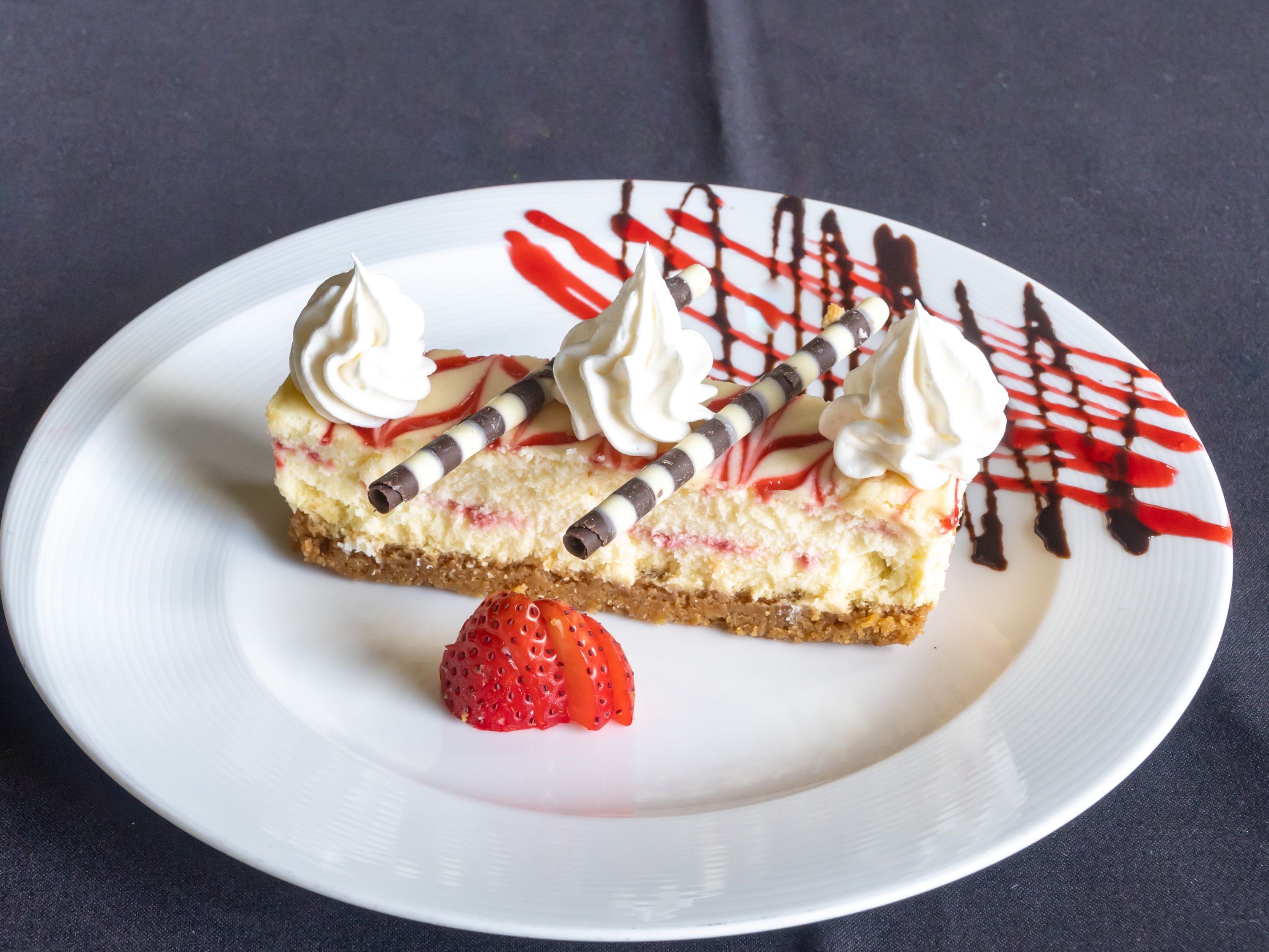 Order Raspberry Swirl Cheesecake  food online from Red Restaurant & Bar store, City of Industry on bringmethat.com