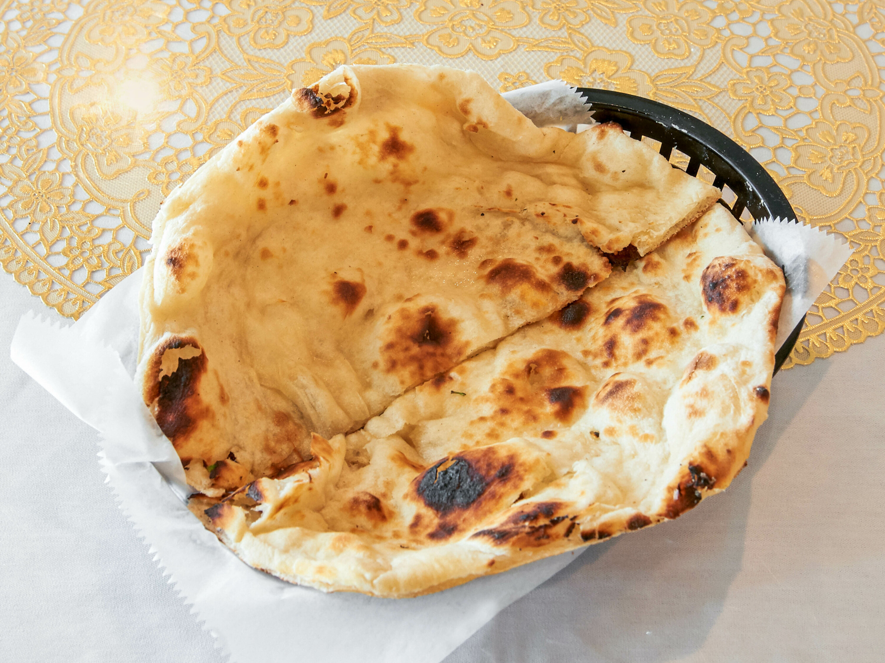 Order 16. Naan food online from India Garden Restaurant store, Indianapolis on bringmethat.com
