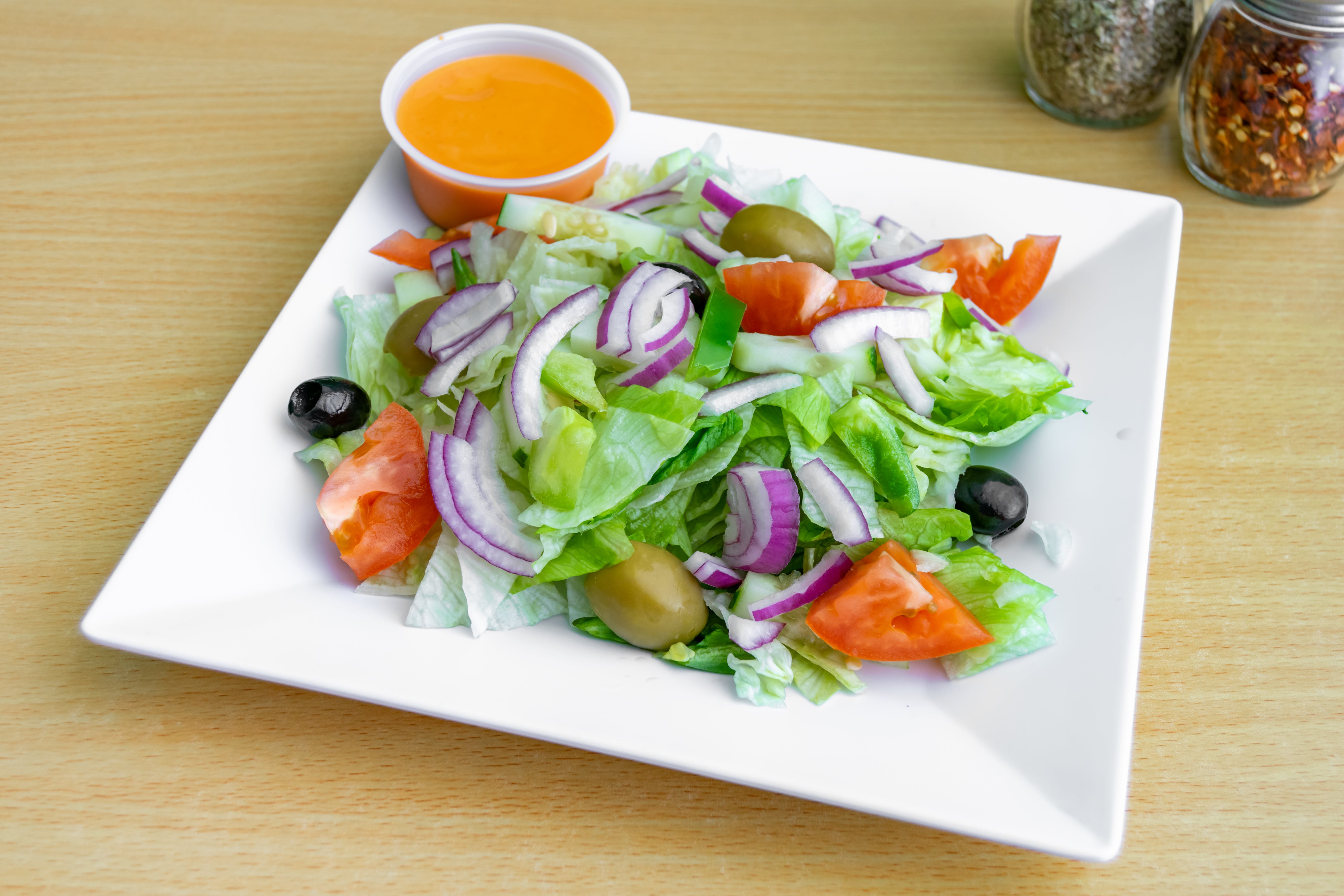 Order Tossed Salad - Salad food online from Dolce Pizza store, East Orange on bringmethat.com