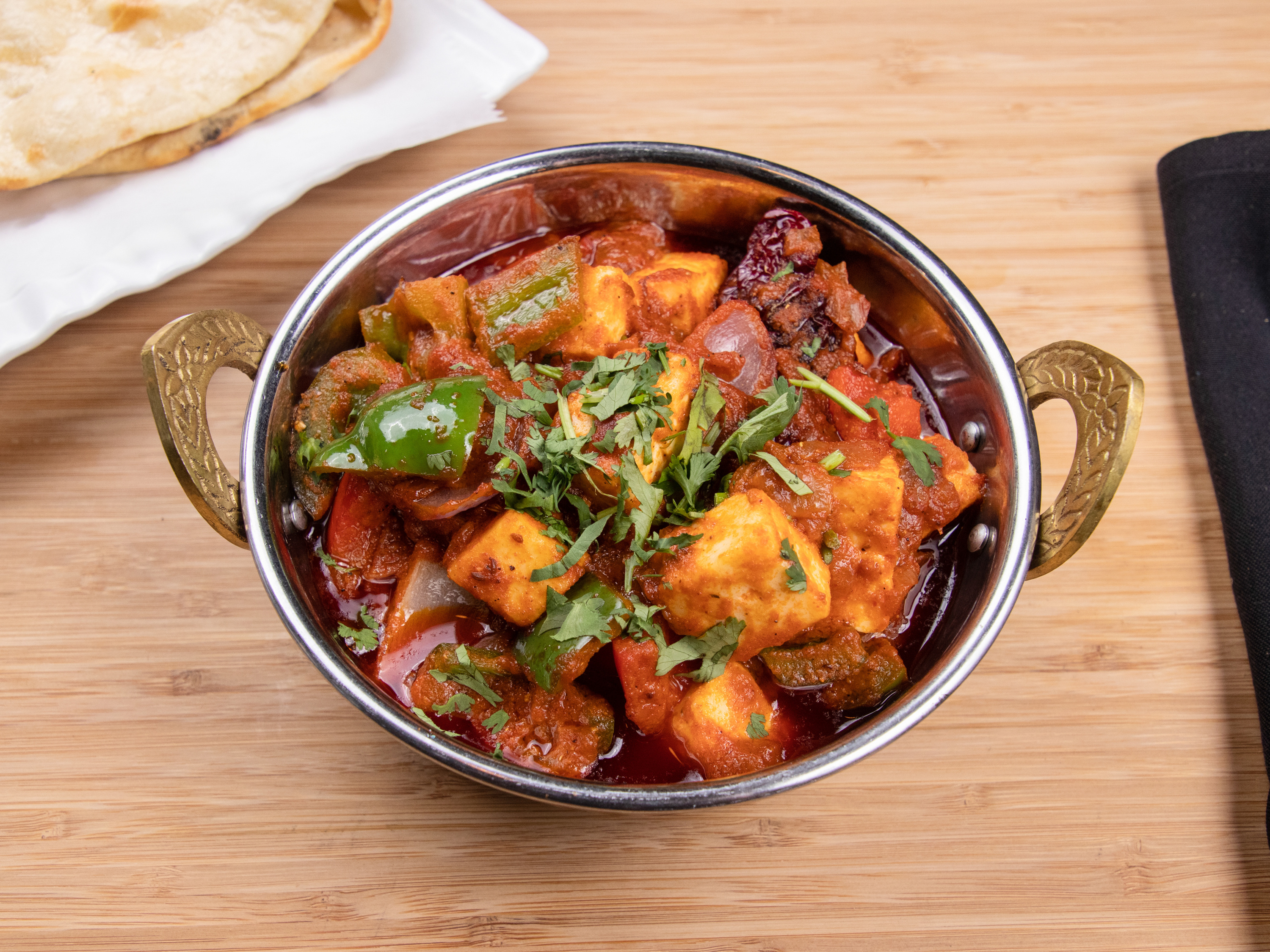Order Kadhai Sabzi - Curries food online from Tadka Indian Cuisine store, Alpharetta on bringmethat.com