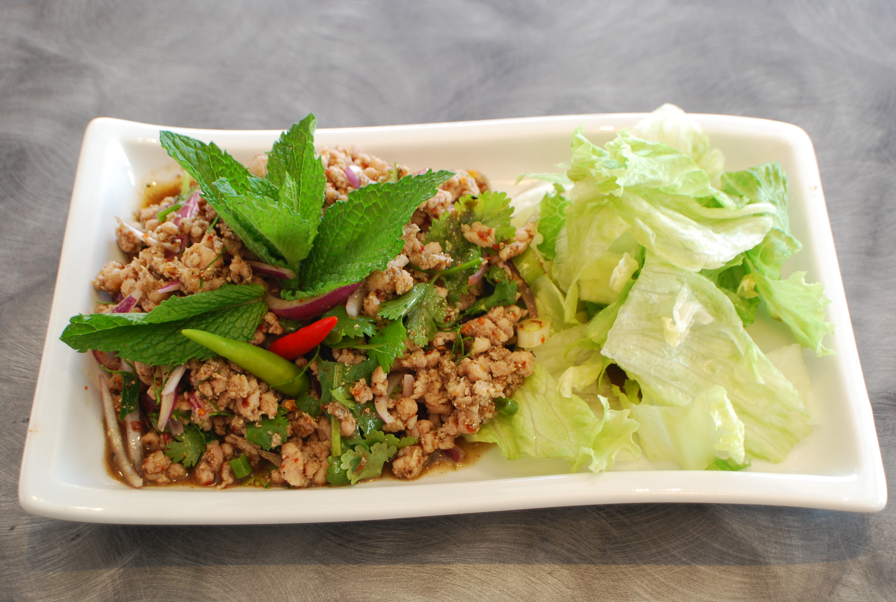 Order 21. Larb Salad food online from Somboon Thai Food store, Santa Ana on bringmethat.com