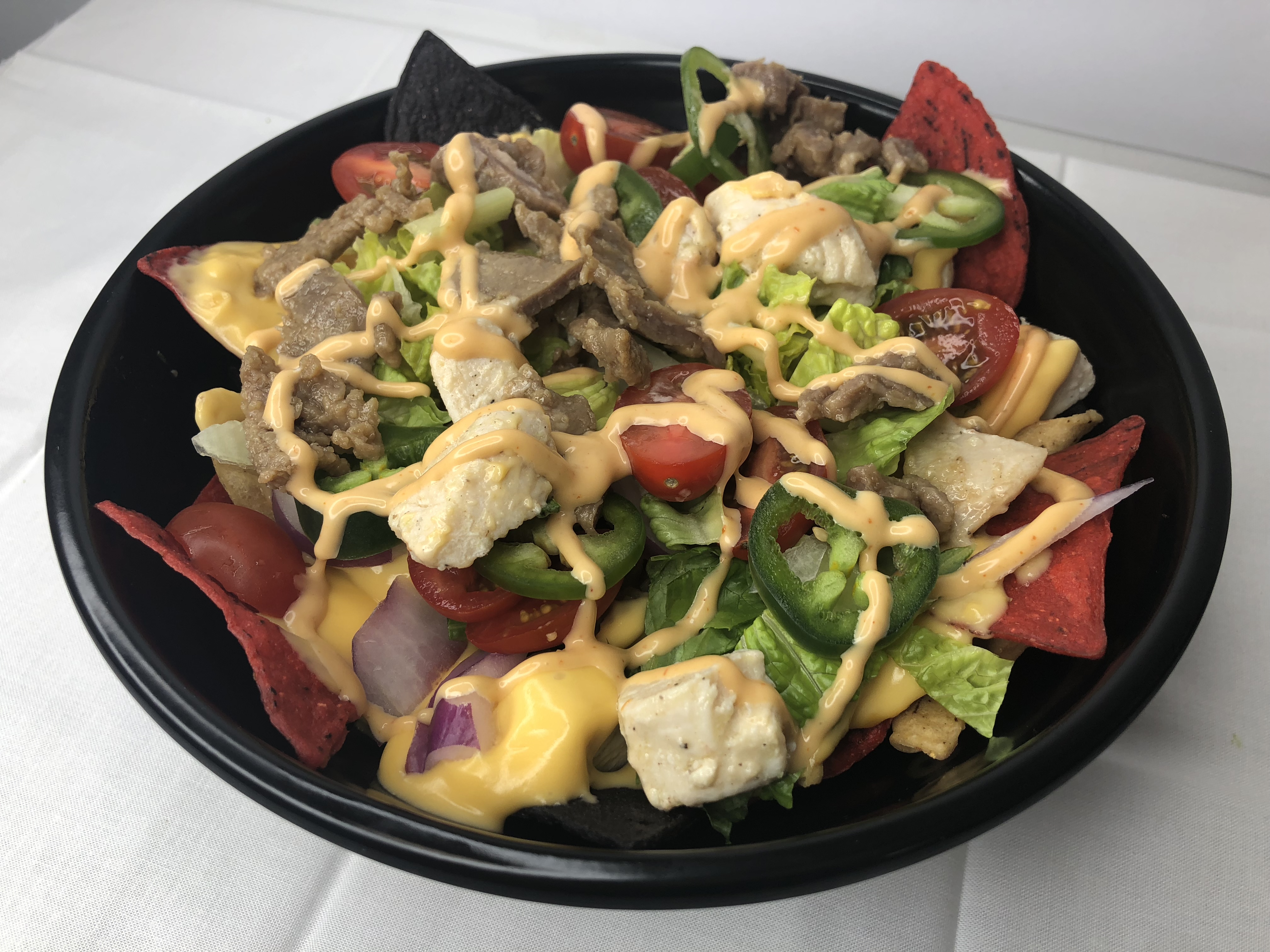 Order 20. Meat Lover Nacho Bowl food online from A Little More store, Columbia on bringmethat.com