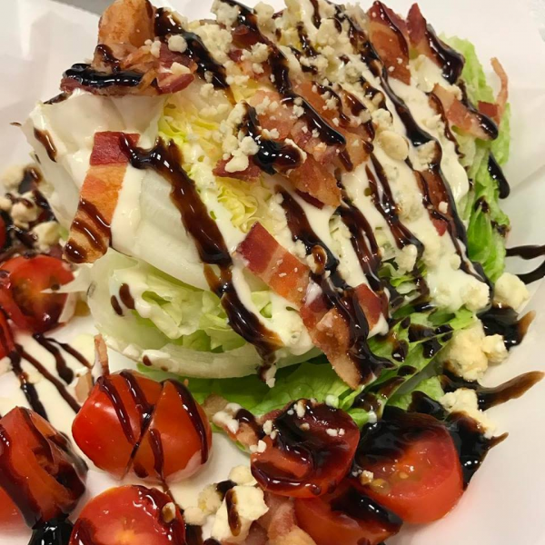 Order Wedge Salad food online from Demo Pizzeria & Deli store, Raleigh on bringmethat.com