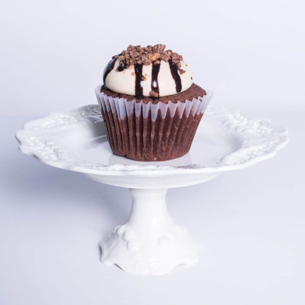 Order Chocolate Peanut Butter Cream Cupcake food online from Camicakes Creamery store, Smyrna on bringmethat.com