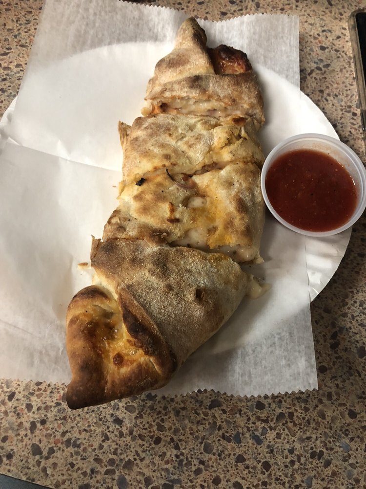 Order Meat Calzone food online from Four Corners Pizza store, Pelham on bringmethat.com