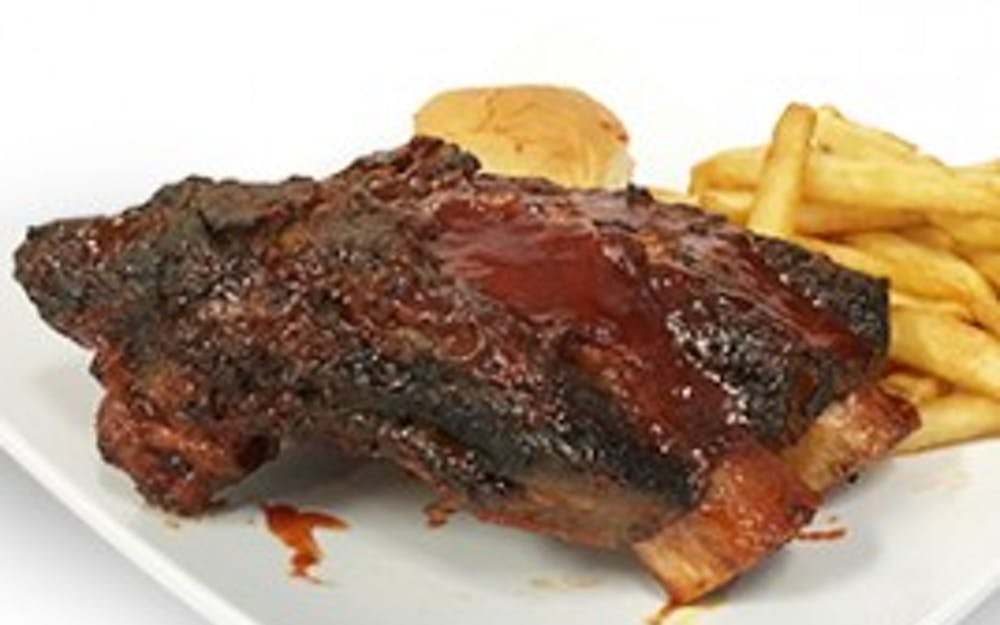 Order Baby Back Ribs - Half Rack food online from Pizza Man store, Columbia on bringmethat.com