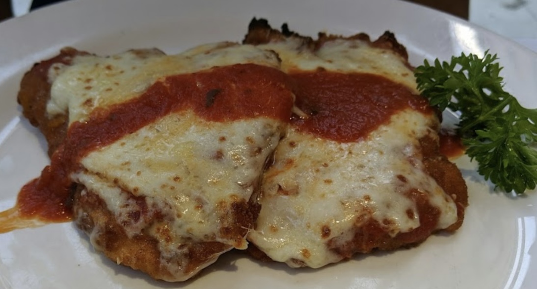 Order Chicken Breast Parmigiana food online from Cappuccino Cafe store, Brooklyn on bringmethat.com