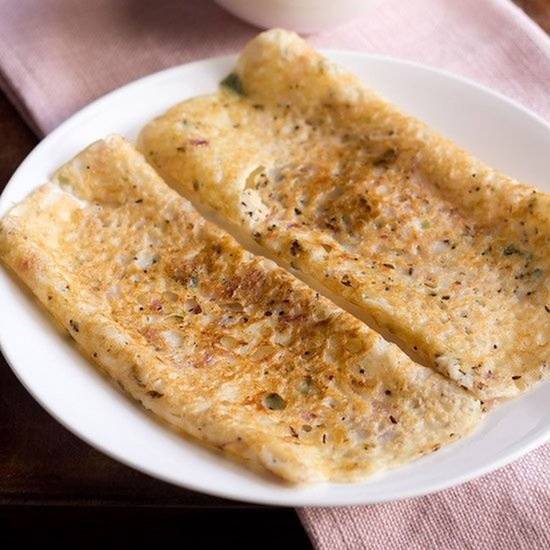 Order Onion Masala Rava Dosa food online from Tower Indian Restaurant store, Morrisville on bringmethat.com