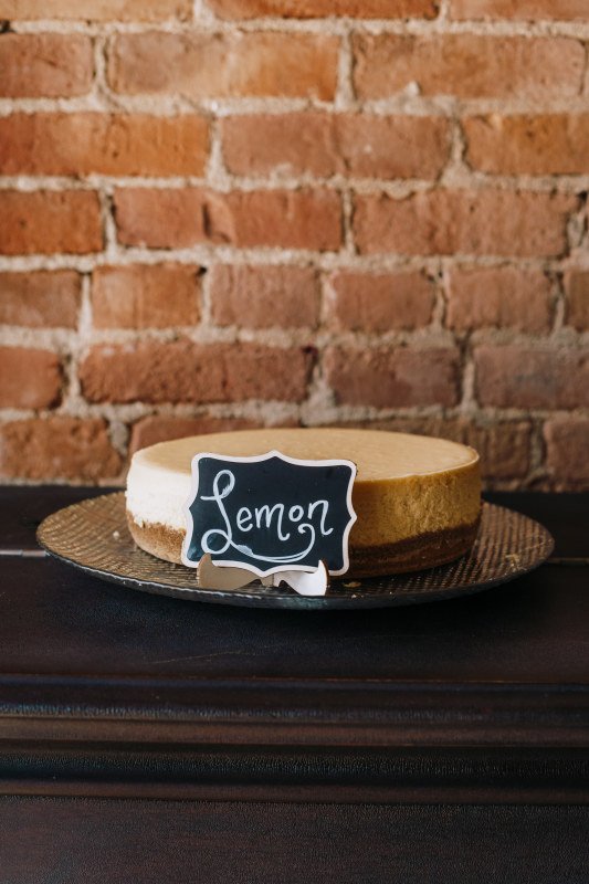 Order Lemon Cheesecake food online from Brew House Coffee & Bake Shop store, Maumee on bringmethat.com