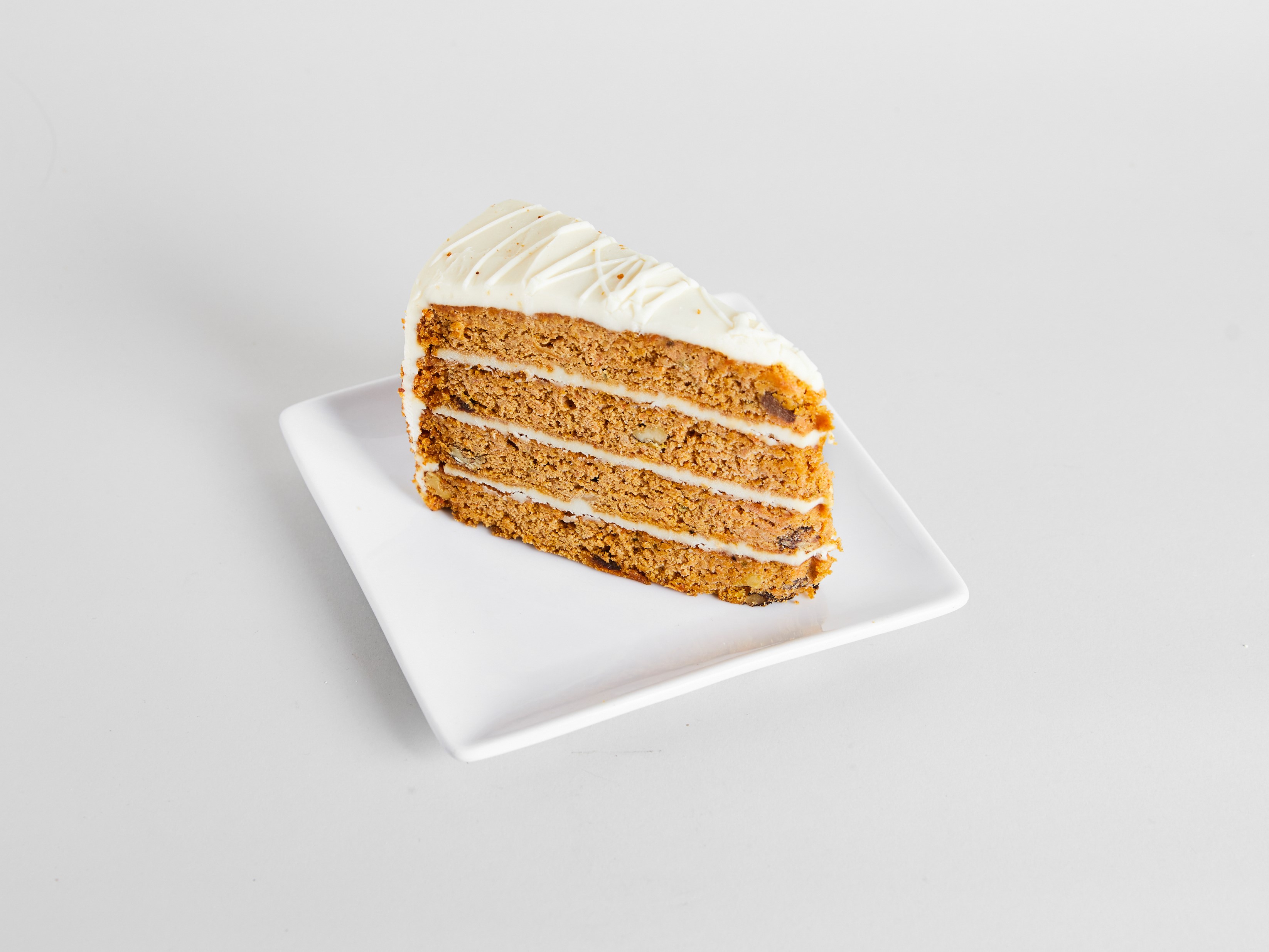 Order Carrot Cake (slice) food online from Sweetwaters Coffee & Tea store, Toms River on bringmethat.com