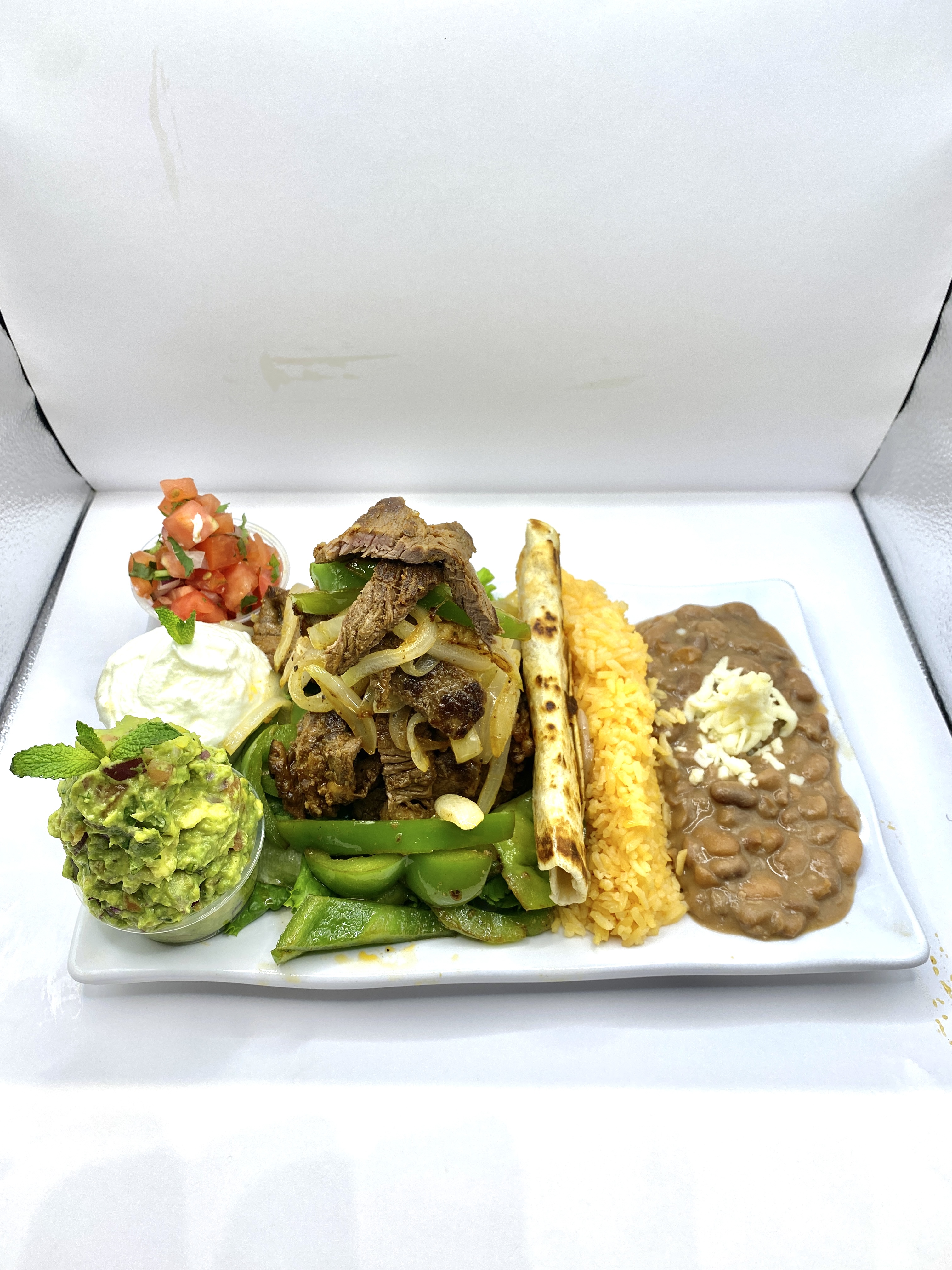 Order Steak Fajitas PlatoTex Mex food online from Tacos Y Jugos Genesis store, Elmhurst on bringmethat.com
