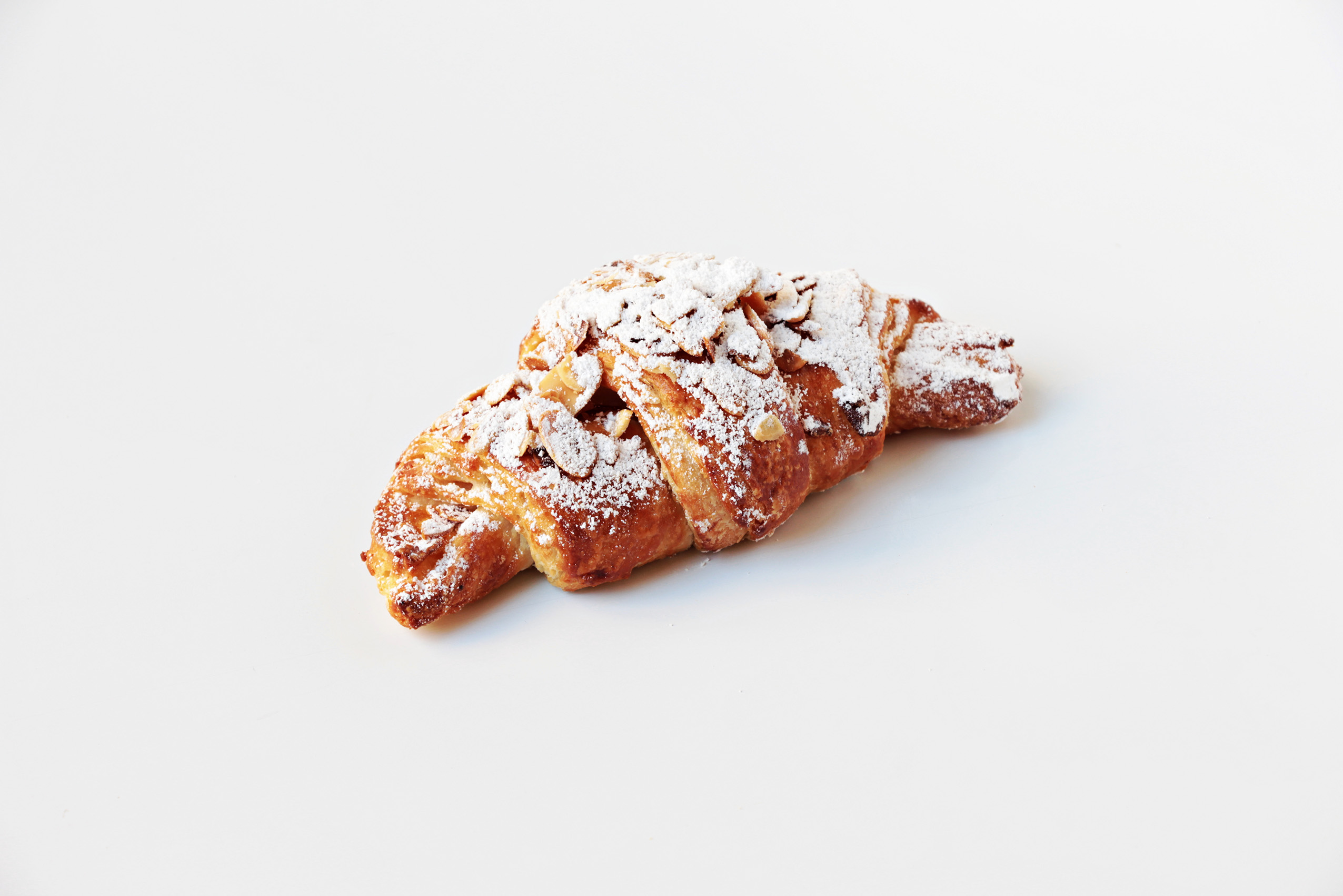 Order Almond Croissant food online from La Boulangerie store, Chicago on bringmethat.com