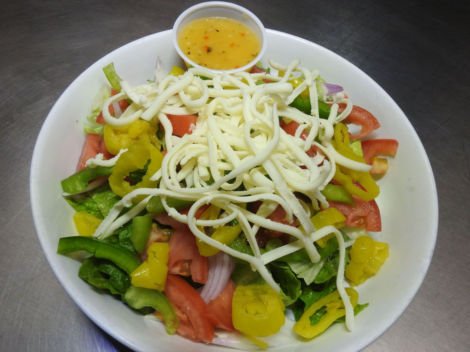 Order Garden Salad food online from Clockwork Pizza store, Tempe on bringmethat.com