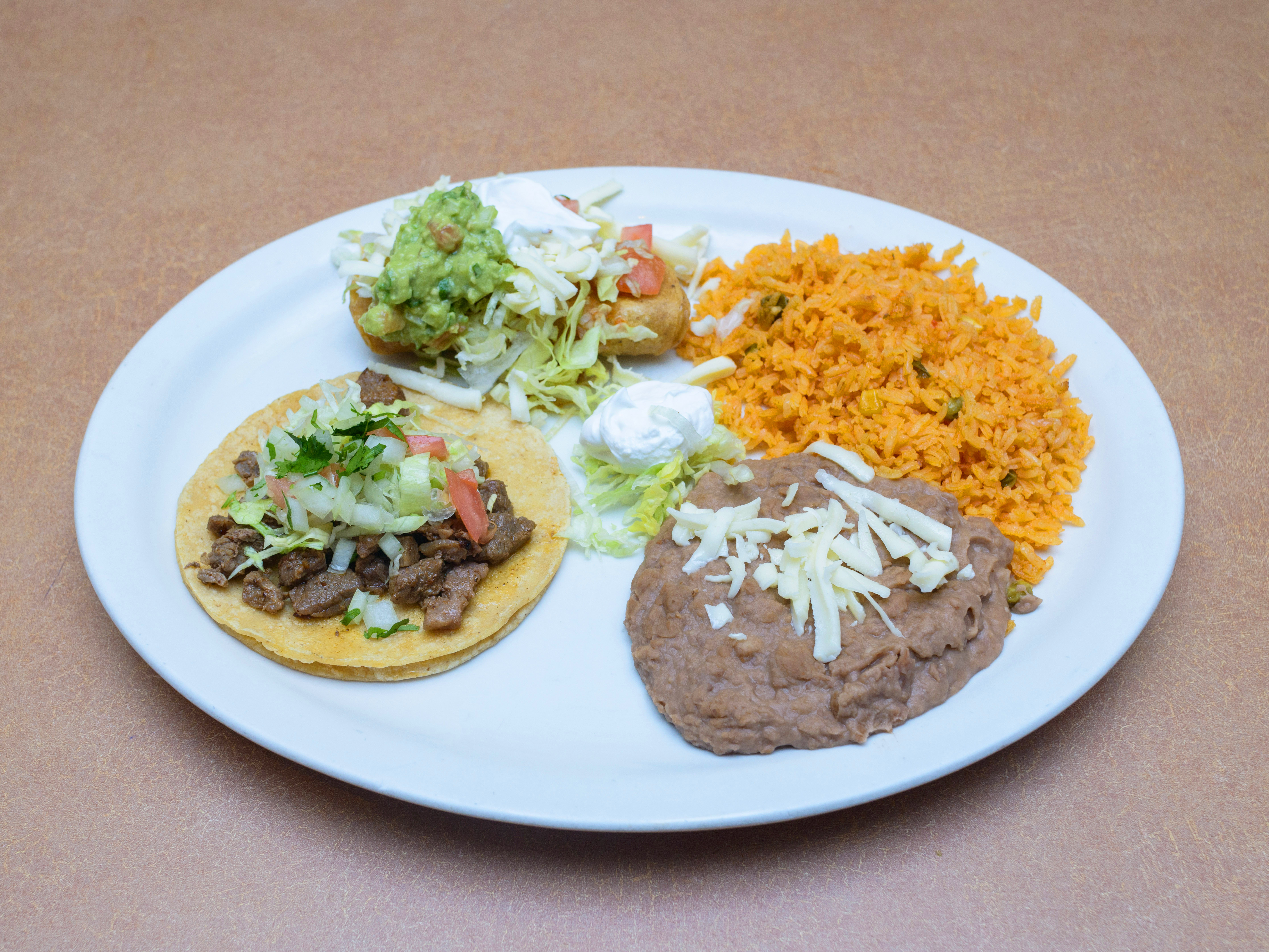 Order 1. Burrito–Taco–Enchilada Combo food online from Tacos El Norte store, Waukegan on bringmethat.com