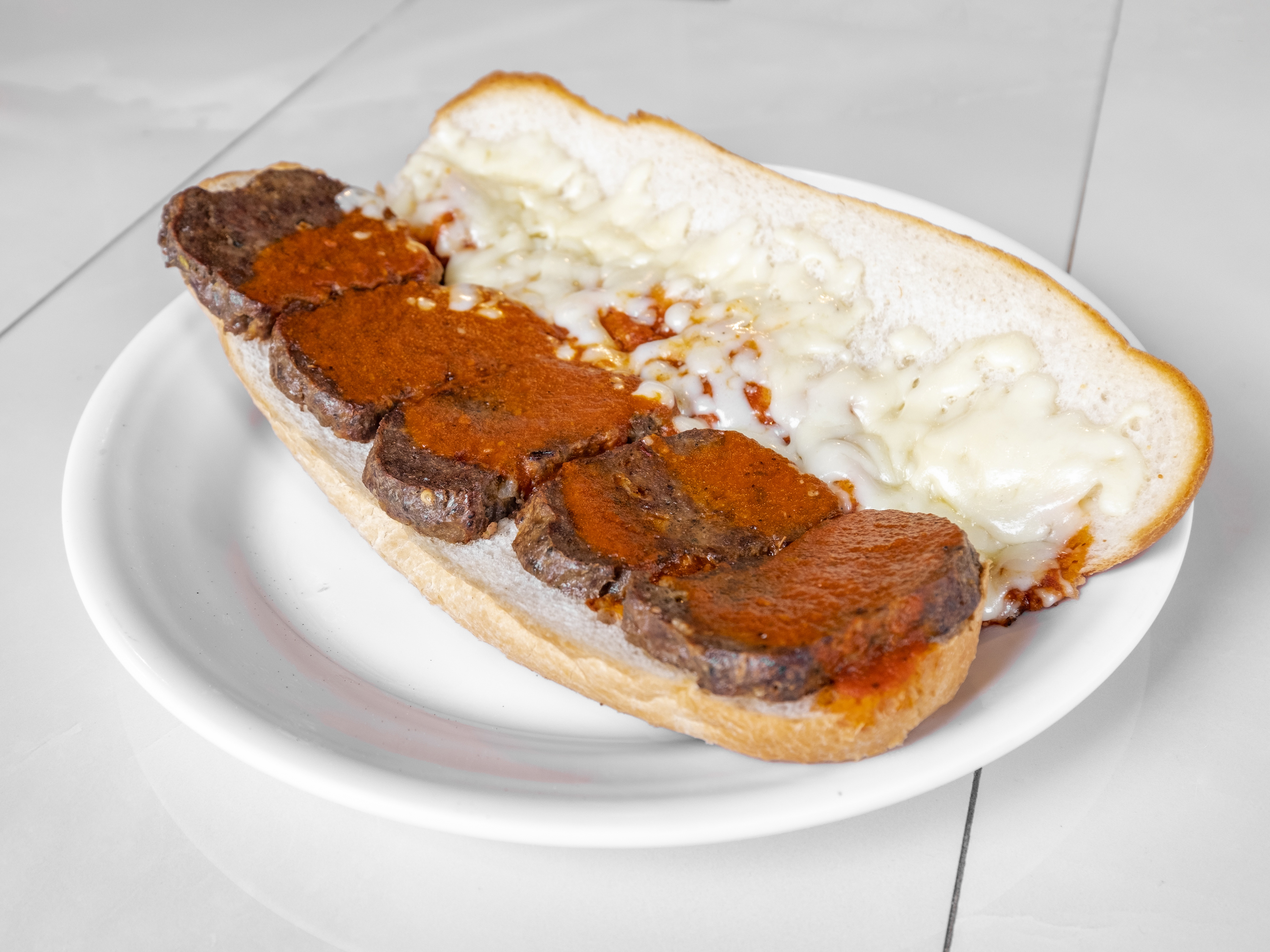 Order Meatball Parmesan Sub food online from New Yorker Pizza store, Leesburg on bringmethat.com