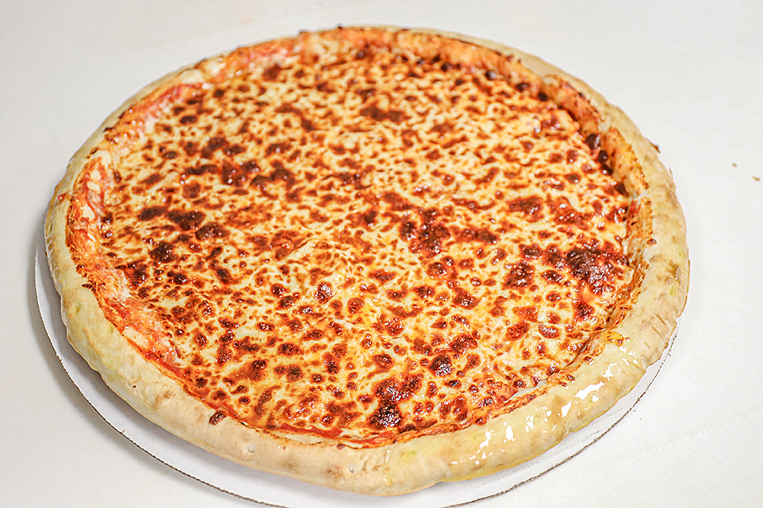 Order Cheese Pizza food online from The Depot Express store, Montezuma on bringmethat.com