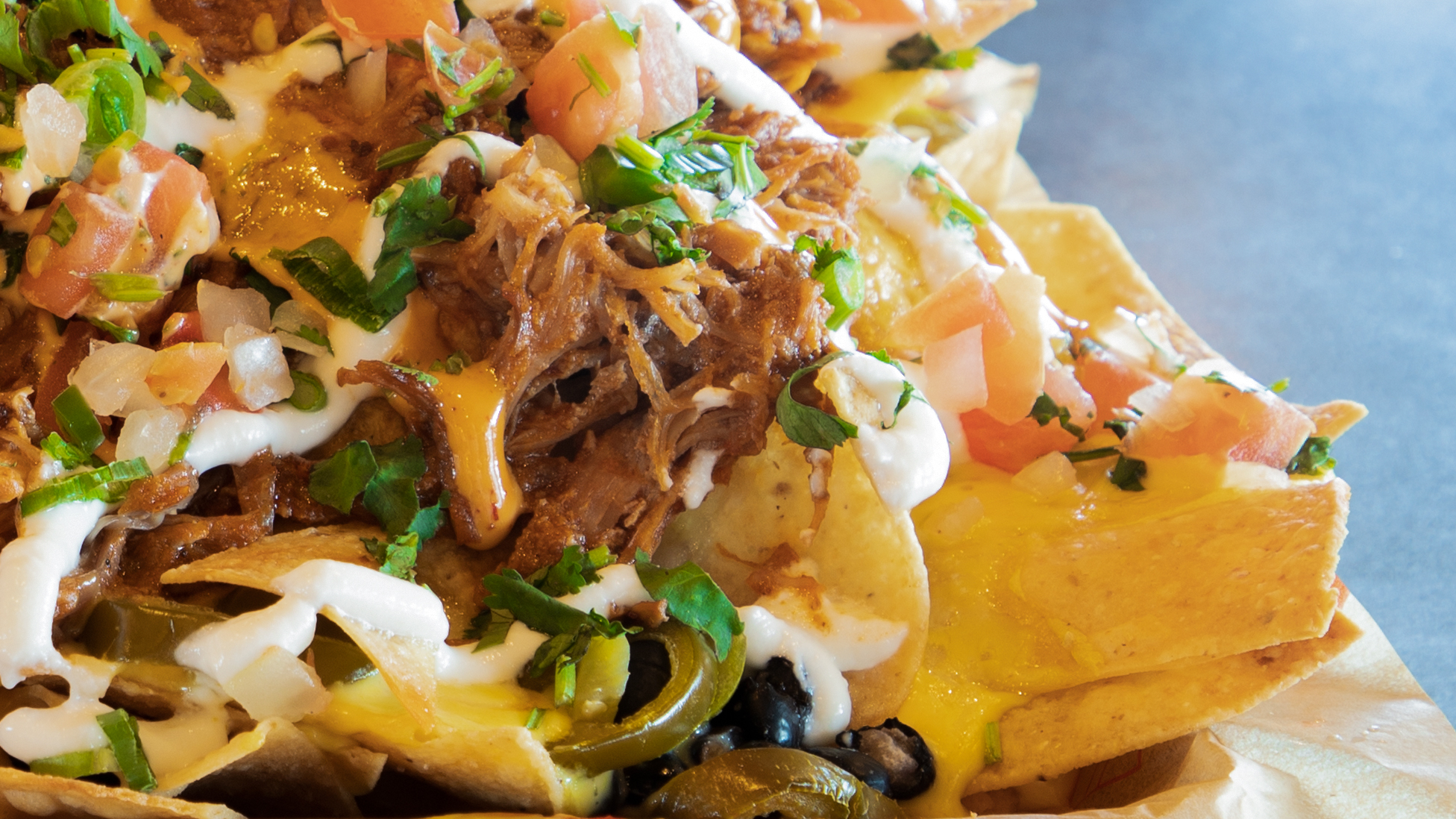 Order Patsy's Pulled Pork Pan Nachos food online from Mama Comfort Food & Cocktails store, Los Alamitos on bringmethat.com