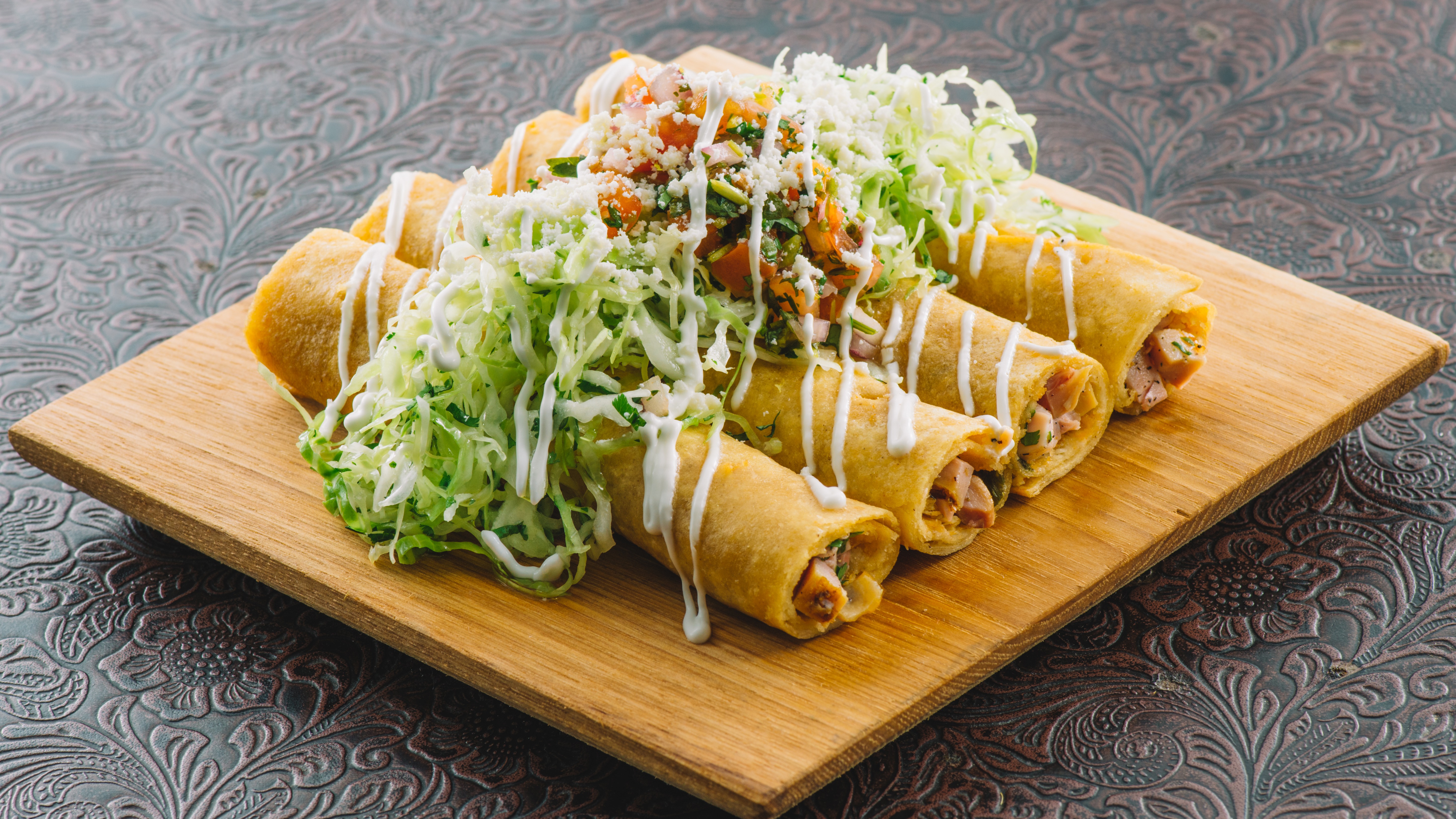 Order Rolled Chicken Taquitos food online from Baja Sharkeez store, Newport Beach on bringmethat.com