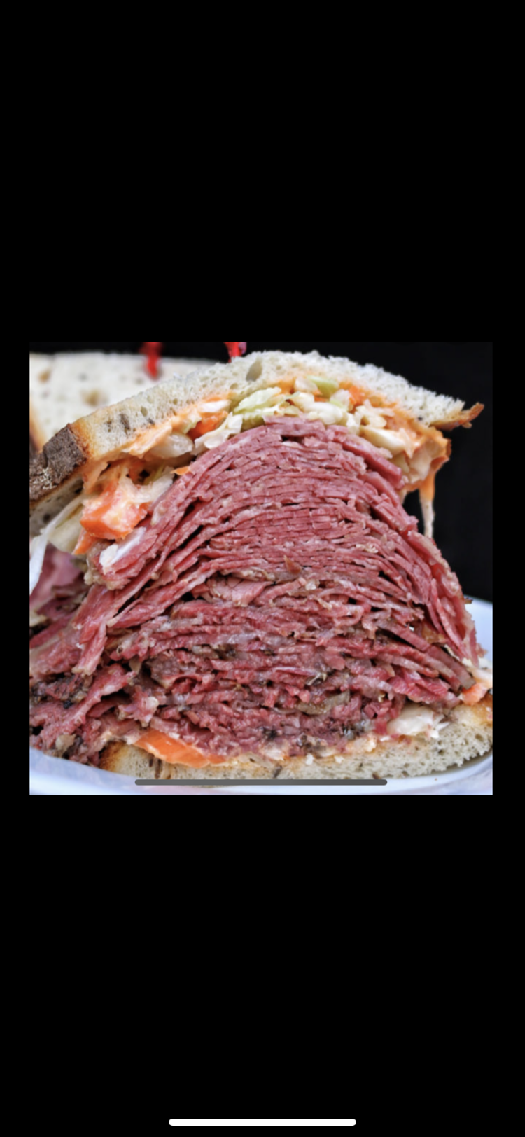 Order 19.  Famous Corned Beef Sandwich food online from Cornedbeef And Pastrami Delicatessen store, Pittsburgh on bringmethat.com