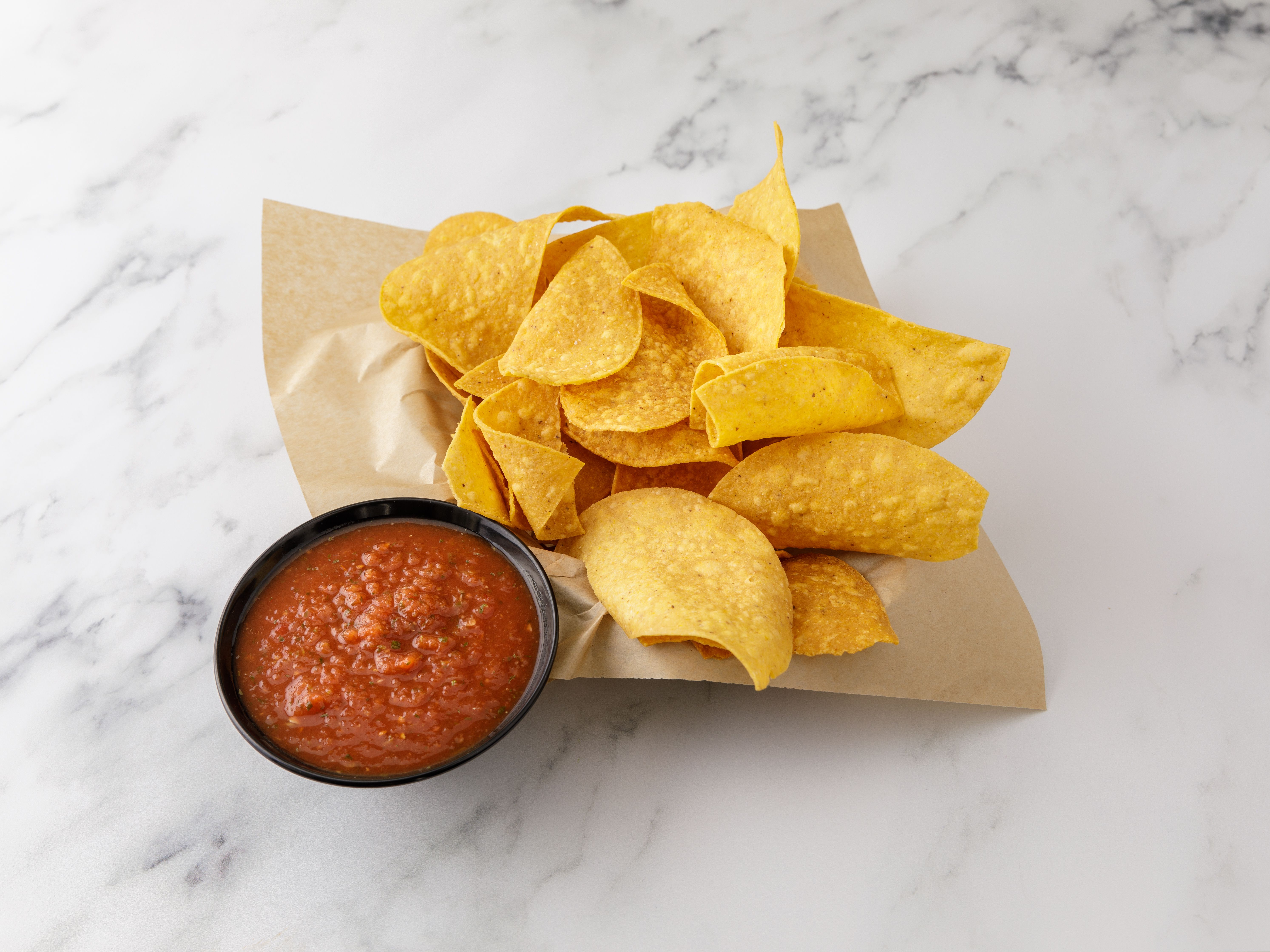 Order Chips and Salsa food online from Cilantro store, New York on bringmethat.com