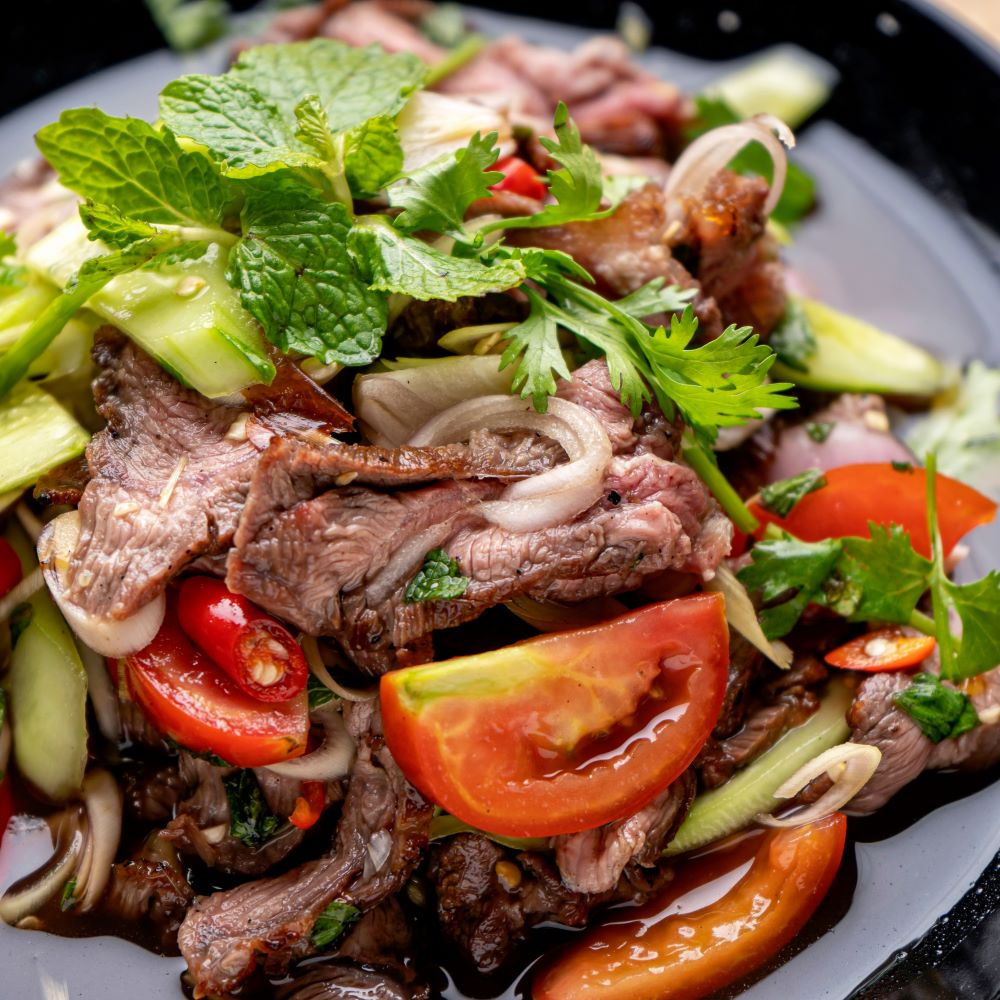 Order Beef or Pork Salad food online from Zabb Thai Spice Kitchen store, Las Vegas on bringmethat.com