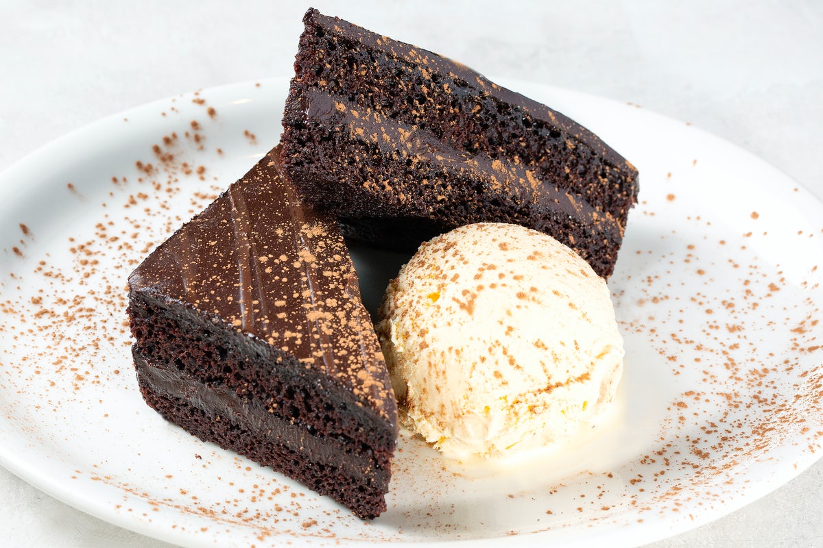 Order CHOCOLATE CAKE food online from Johnny Carinos store, Austin on bringmethat.com