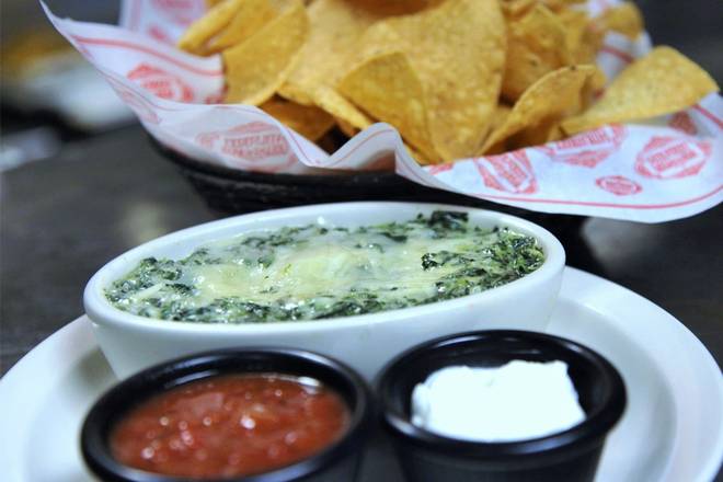 Order CHICAGO SPINACH & ARTICHOKE DIP food online from 54th Street Grill & Bar - store, San Antonio on bringmethat.com