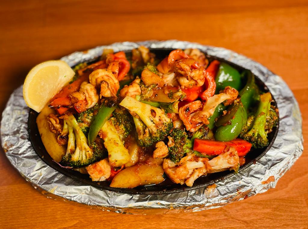 Order Shrimp Jalfrazi food online from Village Tandoor store, Northridge on bringmethat.com