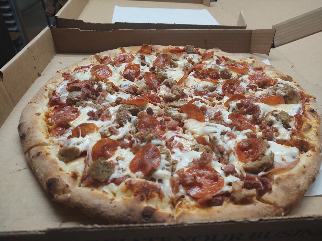 Order Carnivore Pizza - Mini 8'' food online from Poulsbo Woodfired Pizza  store, Poulsbo on bringmethat.com