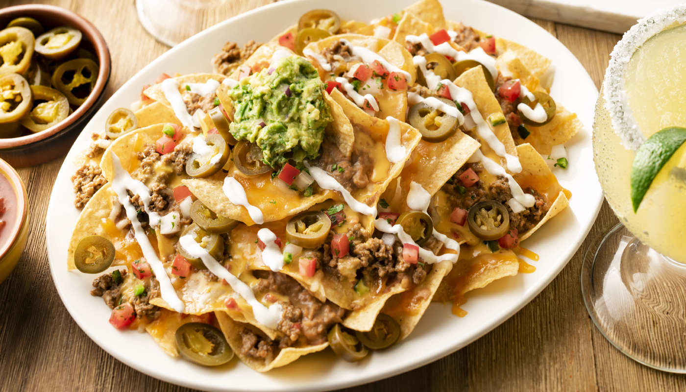 Order Stacked Nachos food online from On The Border store, Las Vegas on bringmethat.com
