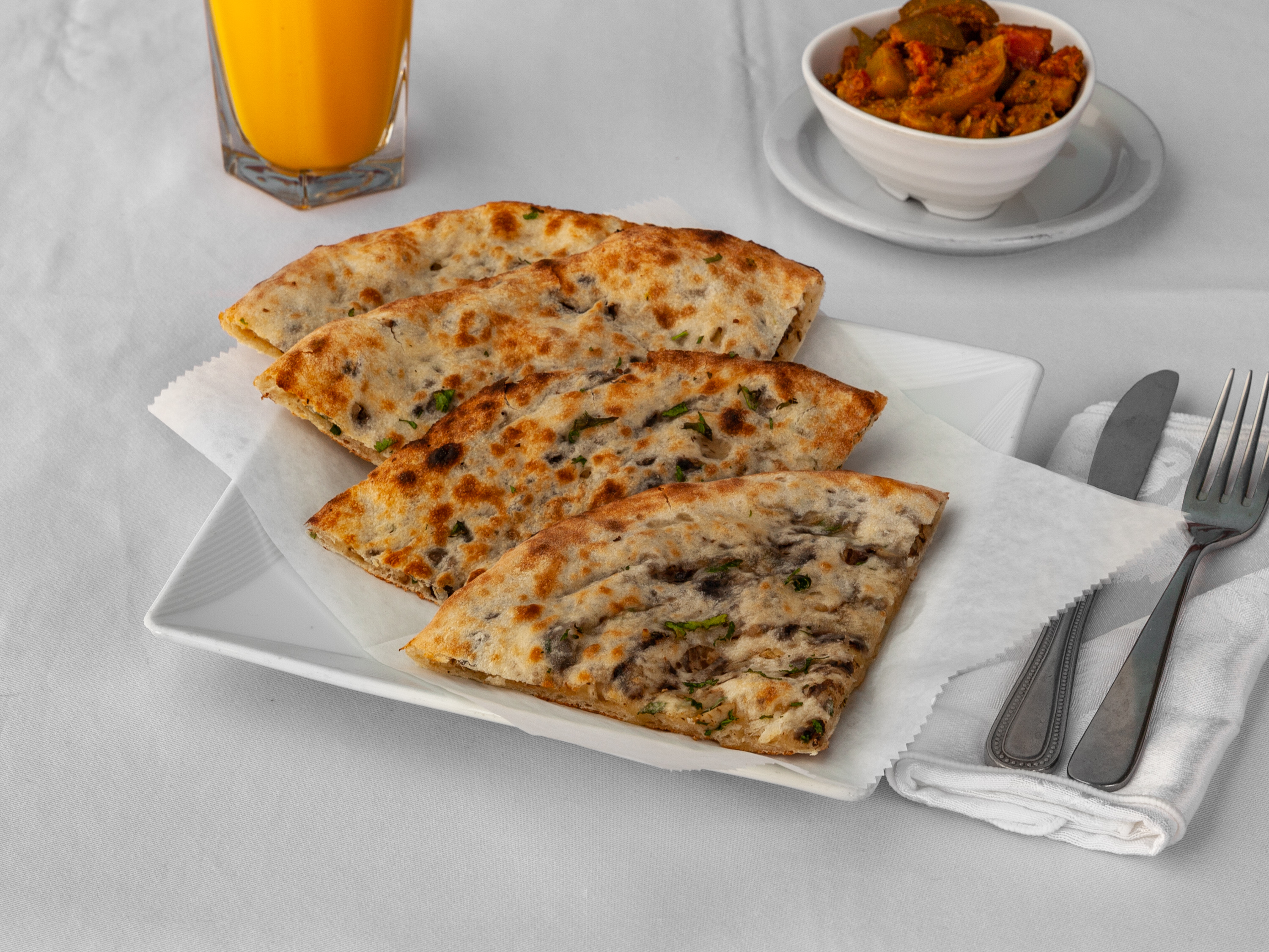 Order Mushroom Naan food online from The Little India Restaurant store, Chicago on bringmethat.com