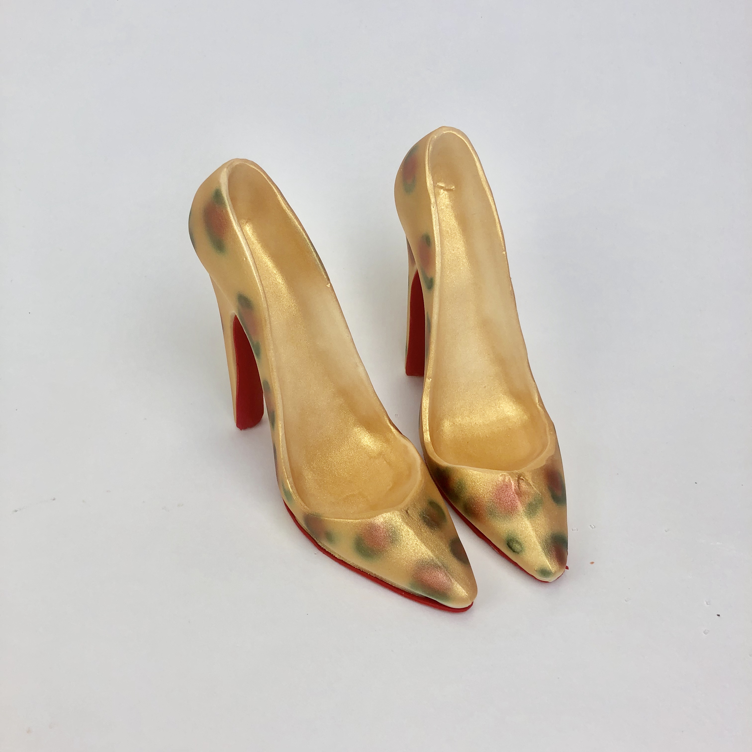 Order Leopard White Chocolate Stiletto Shoe with Red Bottom food online from Cinderella Cakes store, Laguna Niguel on bringmethat.com
