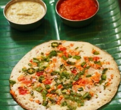 Order Veg Uthappam food online from Peacock Indian Cuisine store, Plano on bringmethat.com
