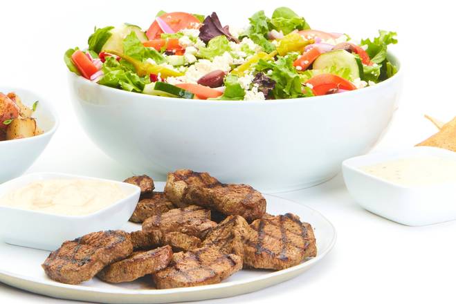 Order Grilled Beef Feast for 4 food online from Taziki's Mediterranean Cafe store, Raleigh on bringmethat.com