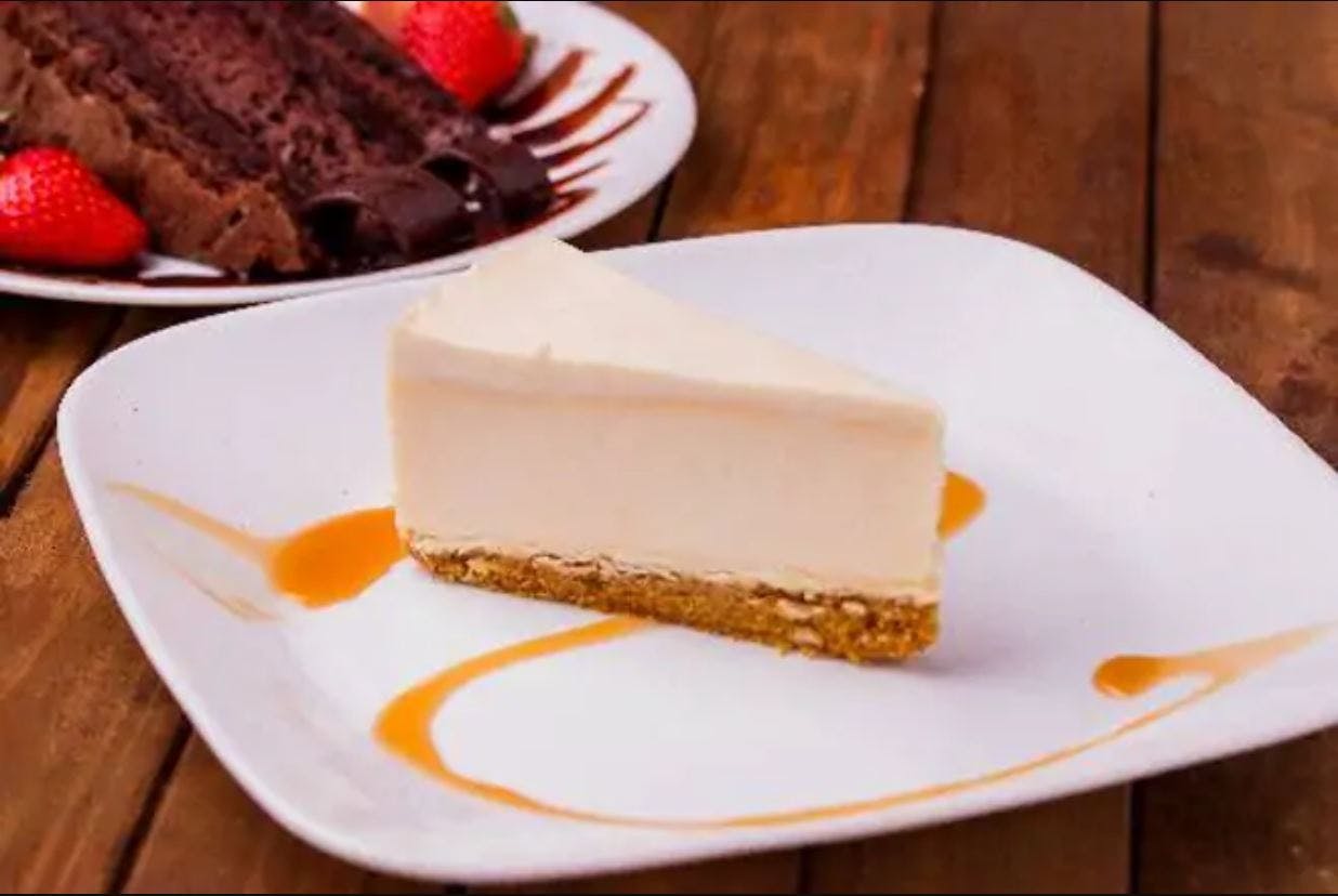 Order Plain Cheesecake - Dessert food online from Pizza Fino store, Houston on bringmethat.com