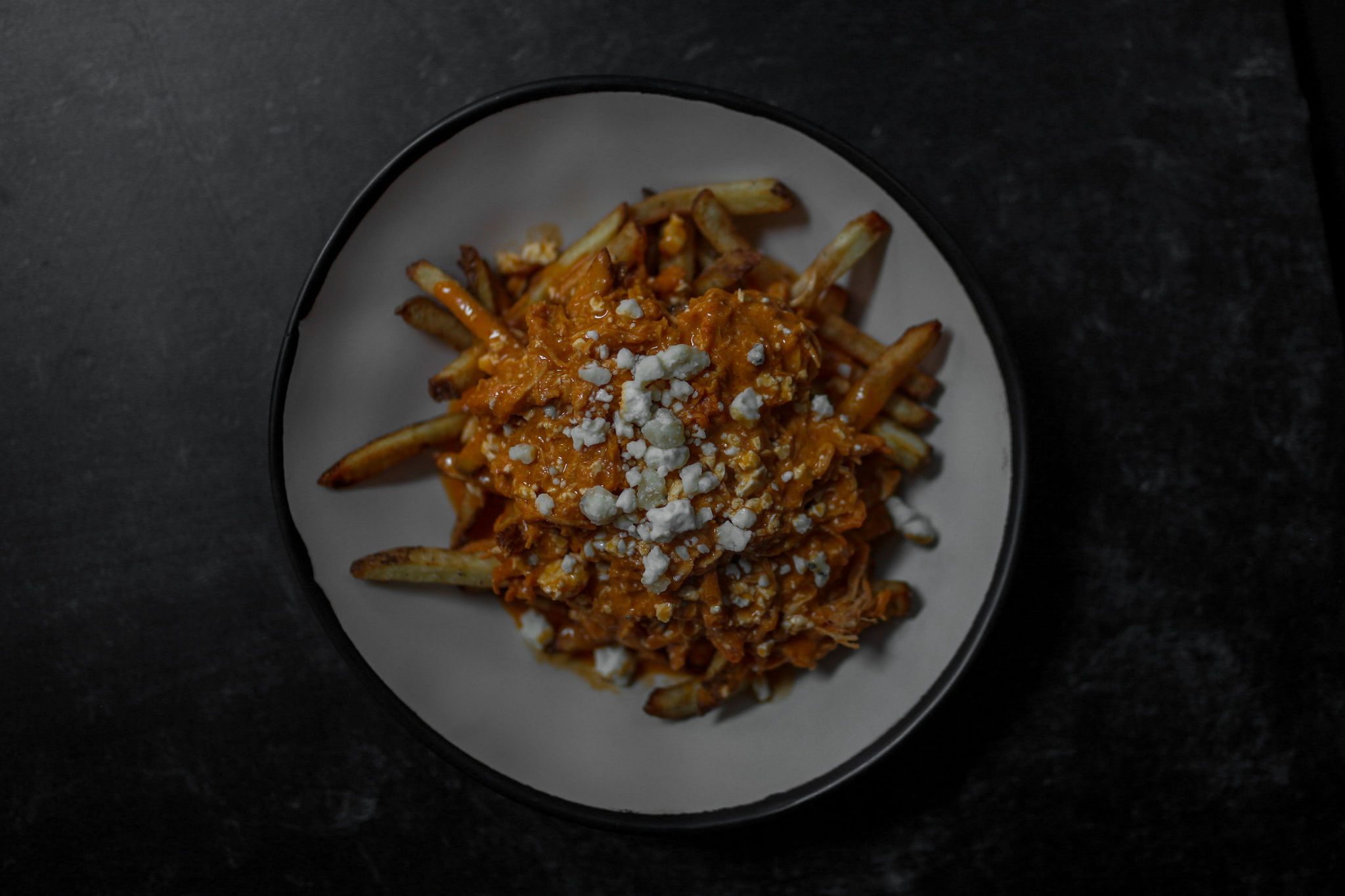 Order Buffalo Fries food online from Beer Belly Deli & Pub store, Syracuse on bringmethat.com