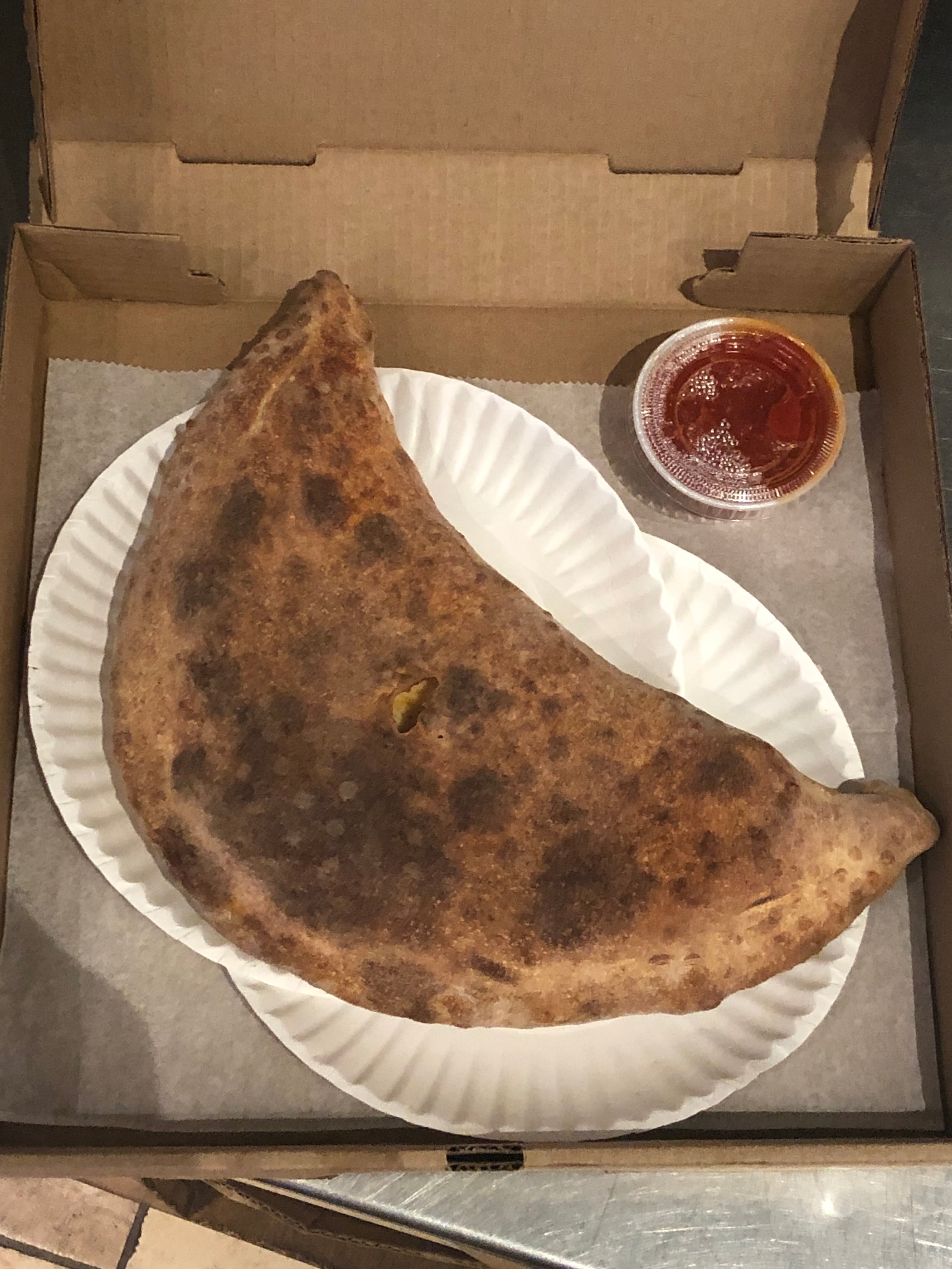 Order Meat Lovers Calzone - Calzone food online from Pizza Etc store, Brighton on bringmethat.com