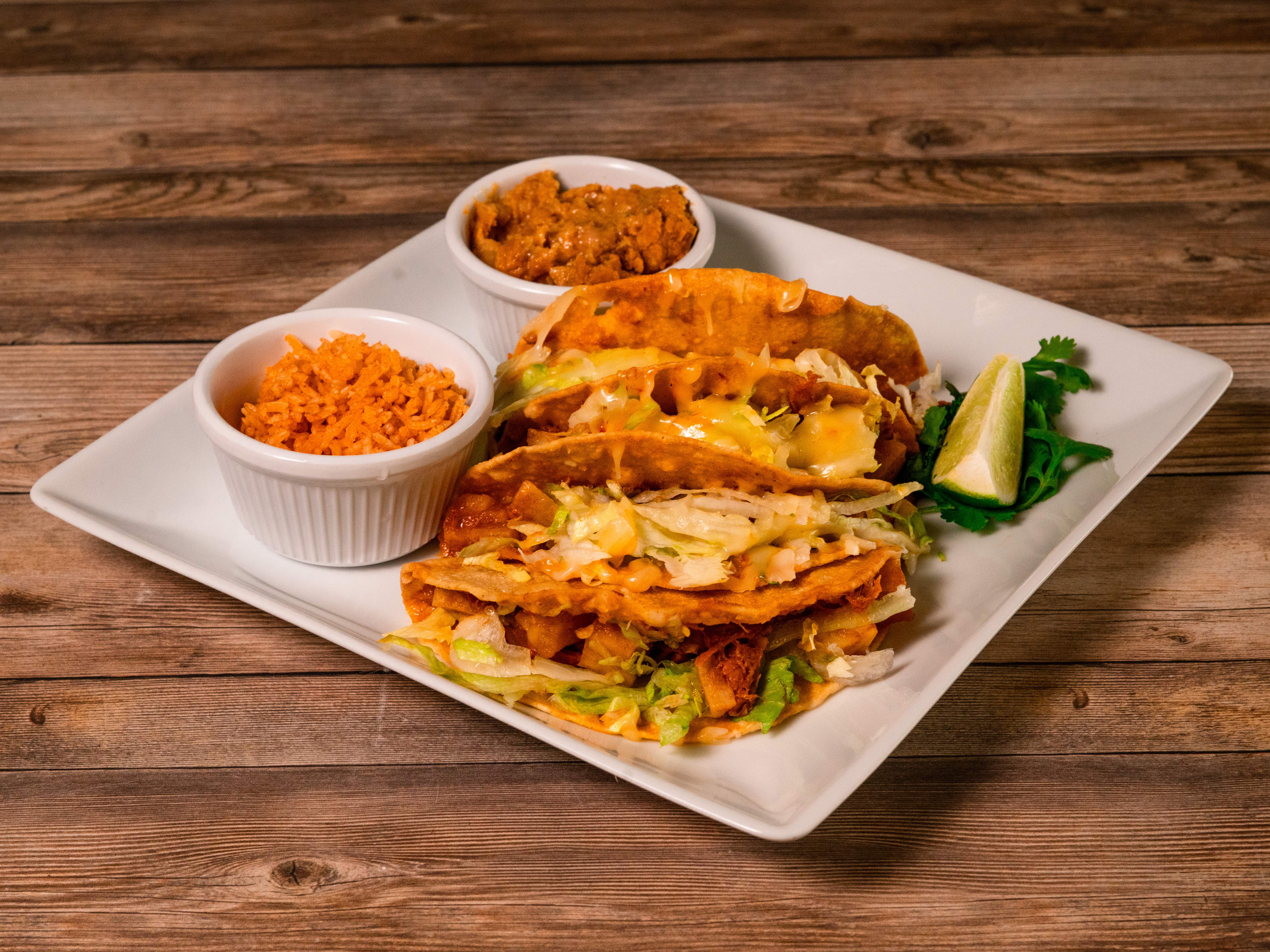 Order Deshebrada Taco food online from Rafas Burritos store, El Paso on bringmethat.com