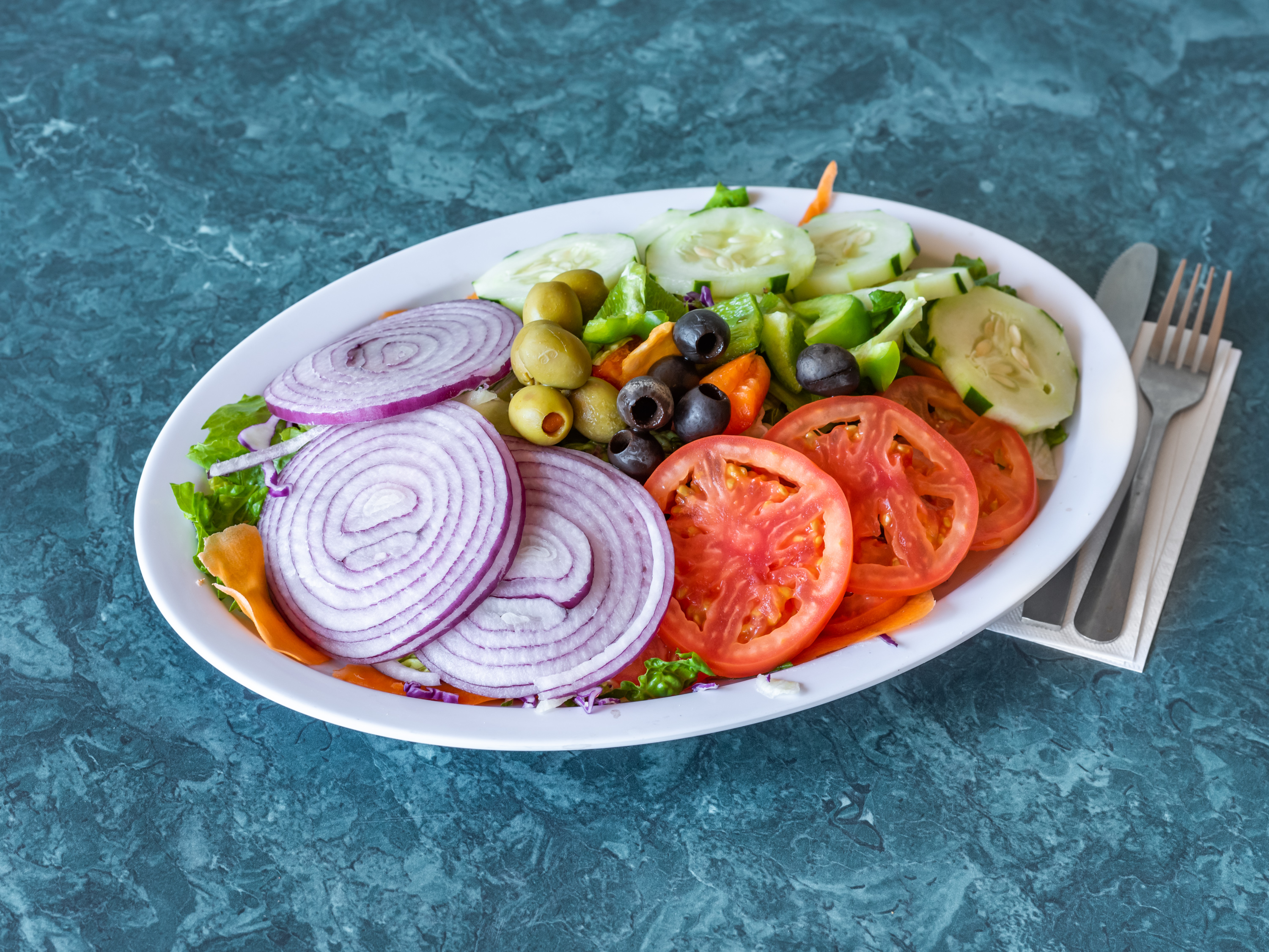 Order Tossed Garden Salad food online from Guidos Pizza store, Eatontown on bringmethat.com