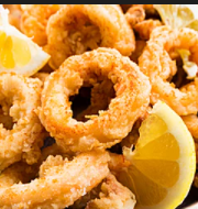 Order Calamari Grilled food online from Raffi's Locale store, Chicago on bringmethat.com