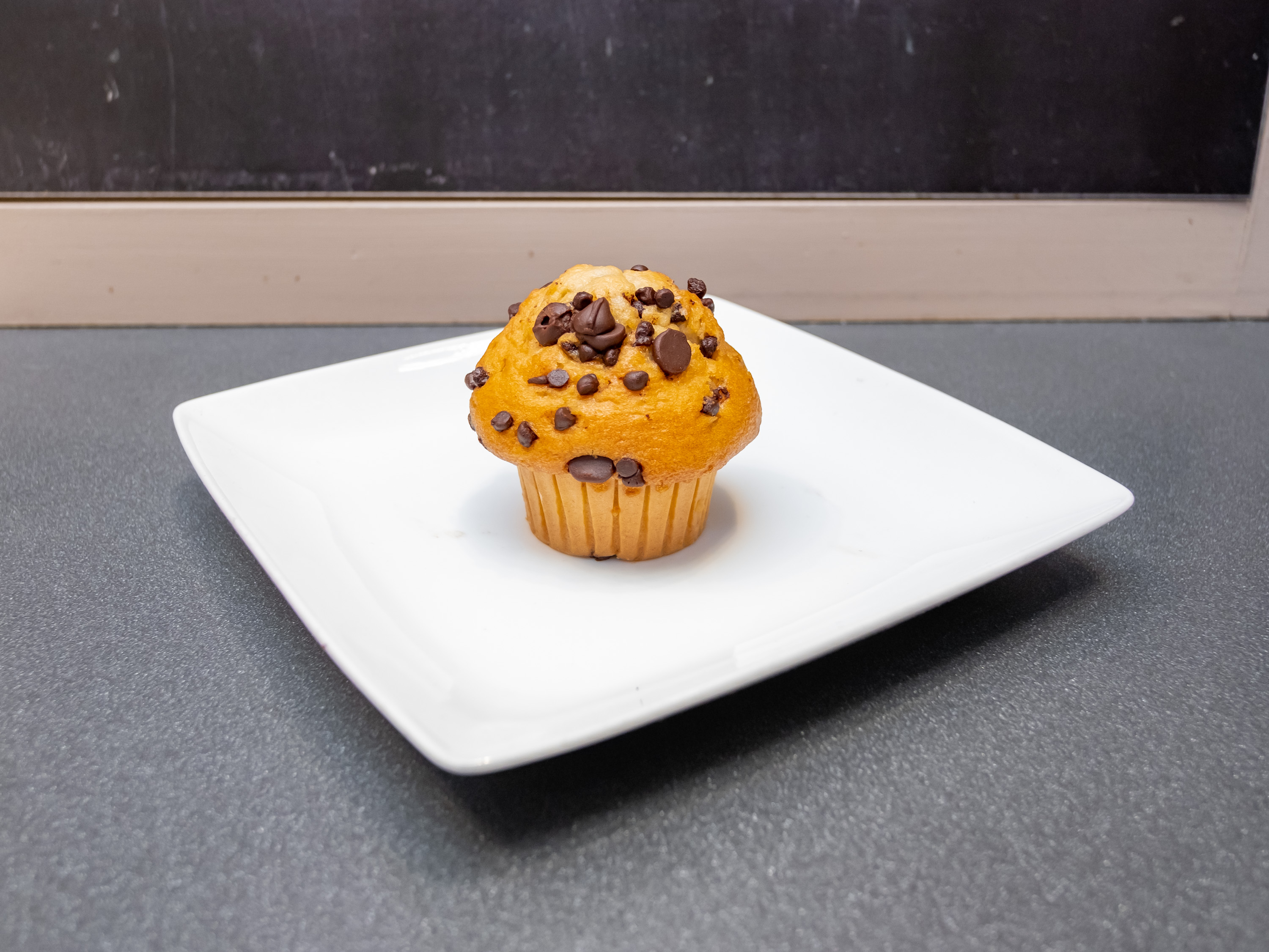 Order Chocolate Chips Muffin  food online from Charlotte Artisanal store, McLean on bringmethat.com