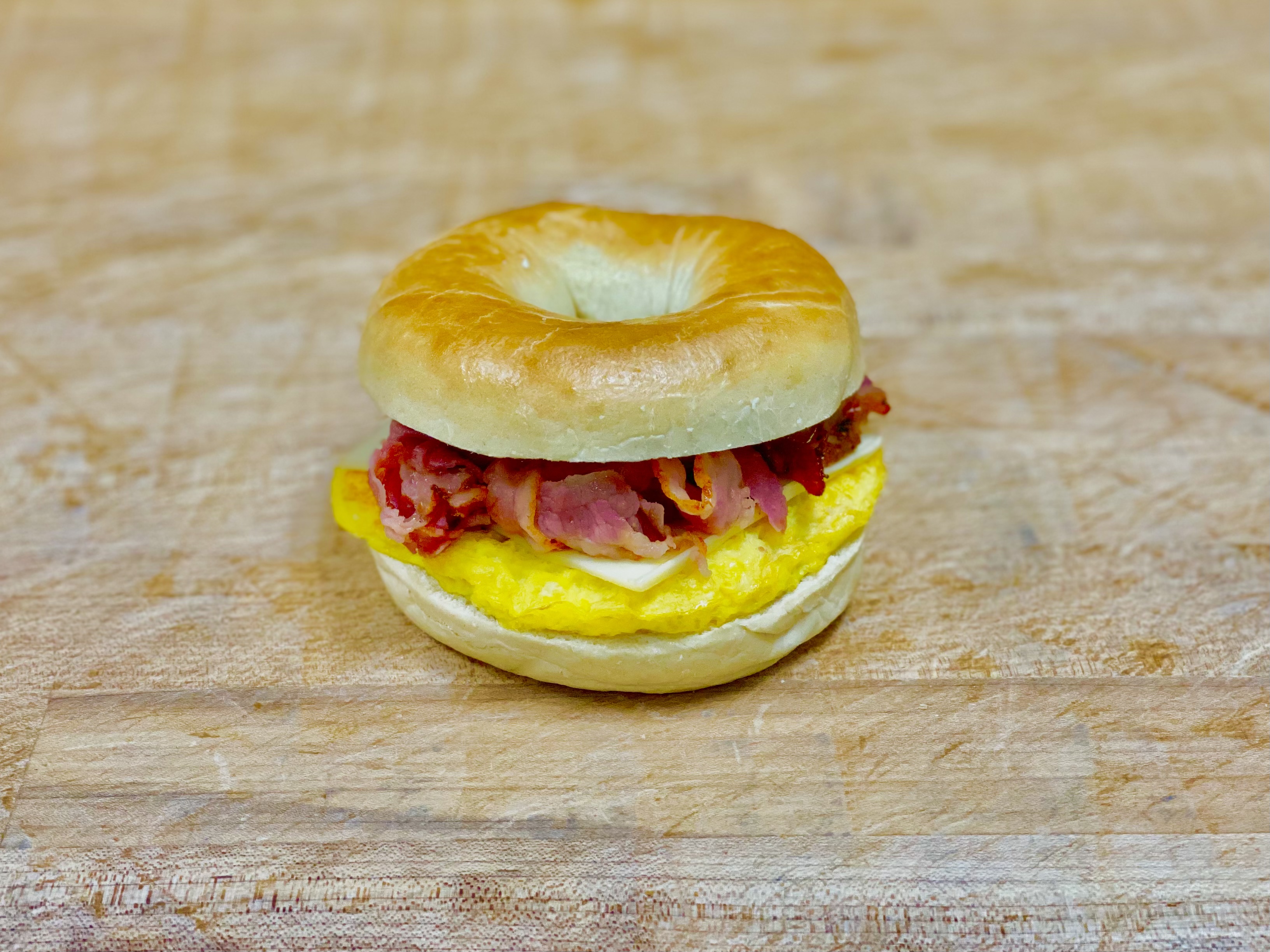 Order B-20 Pastrami & Egg & Cheese Bagel food online from K-Inn Donuts store, Paramount on bringmethat.com