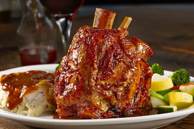 Order PORK OSSO BUCO food online from Millers Ale House store, Alpharetta on bringmethat.com