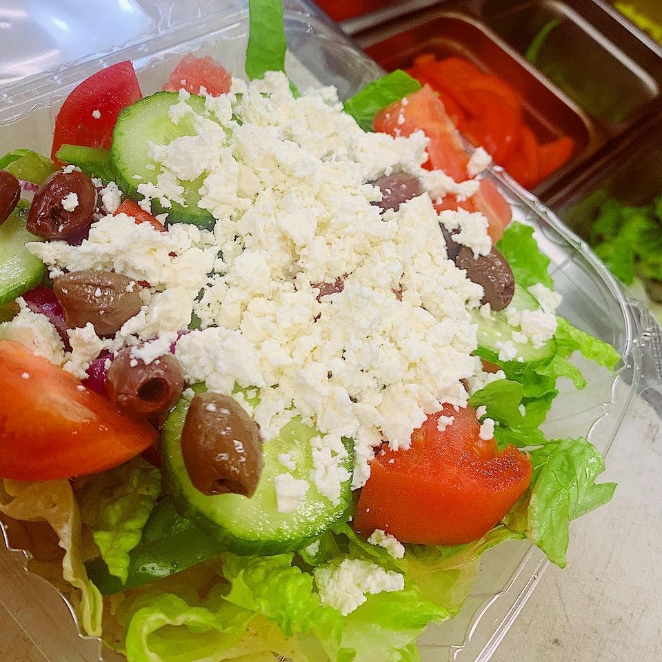 Order Greek Salad - Salad food online from Milanos Pizza store, Providence on bringmethat.com