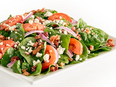 Order Spinach Tomato Salad - Salad food online from Pizza Guys store, Elk Grove on bringmethat.com