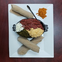 Order Special Kitfo food online from Habesha Market and Carry-Out store, Washington on bringmethat.com