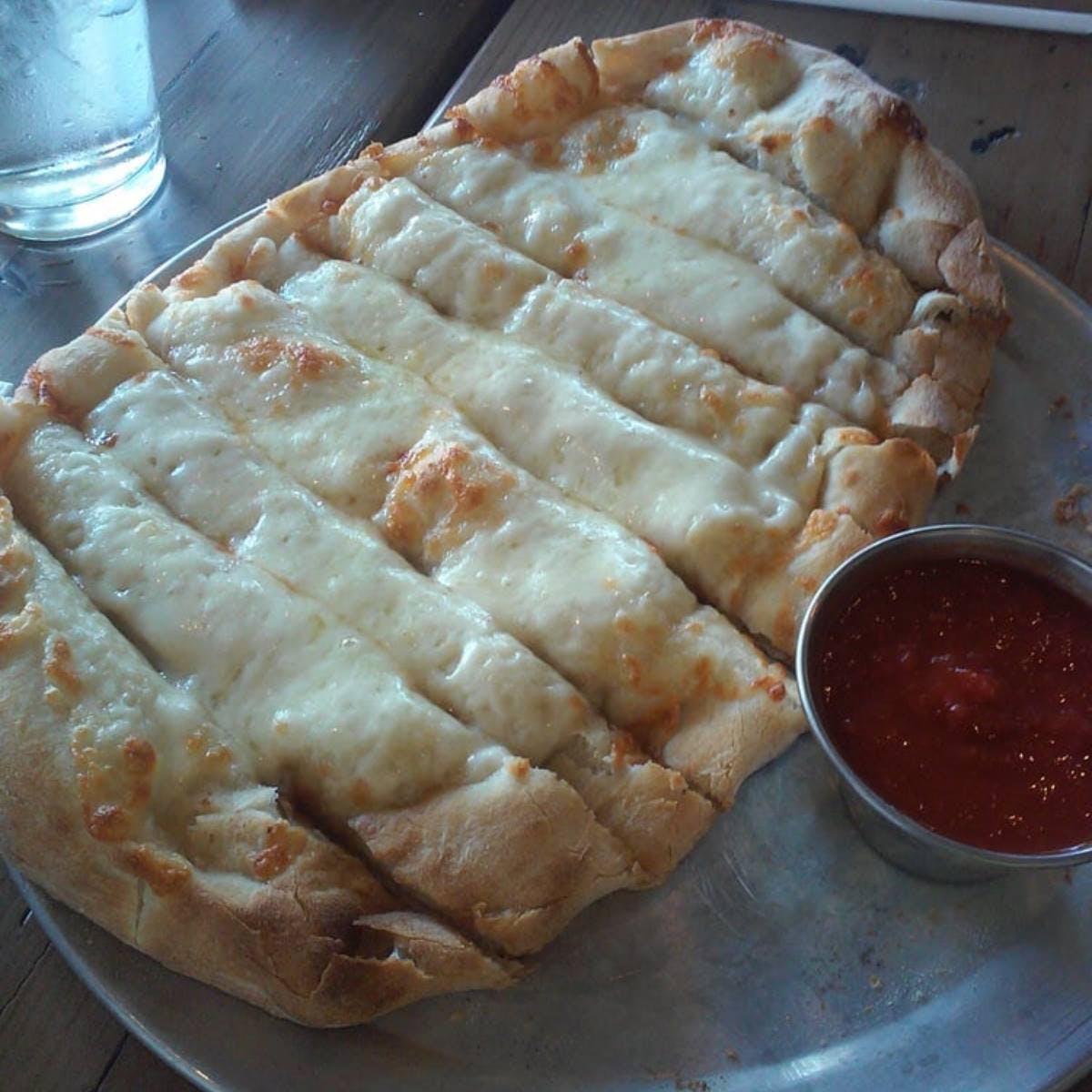 Order Cheesy Bread Sticks - Appetizer food online from Trumbull Pizza Co store, Trumbull on bringmethat.com