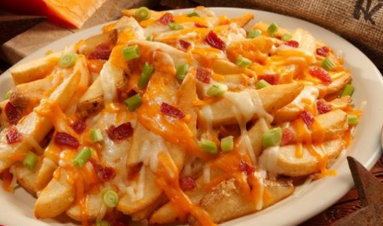 Order Cheese Fries food online from Colton's Steakhouse store, Jefferson City on bringmethat.com